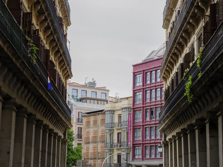 Historic Madrid Walking Tour 16 Painted facades and arcades along Calle Mayor in central Madrid, on a Dinamo Historic Madrid Walking Tour