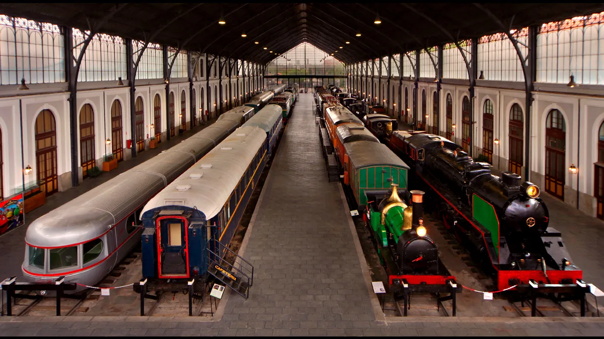 things to do in madrid by bike 4 Steam locomotives and vintage carriages under the iron roof of the old Delicias station, Madrid Railway Museum